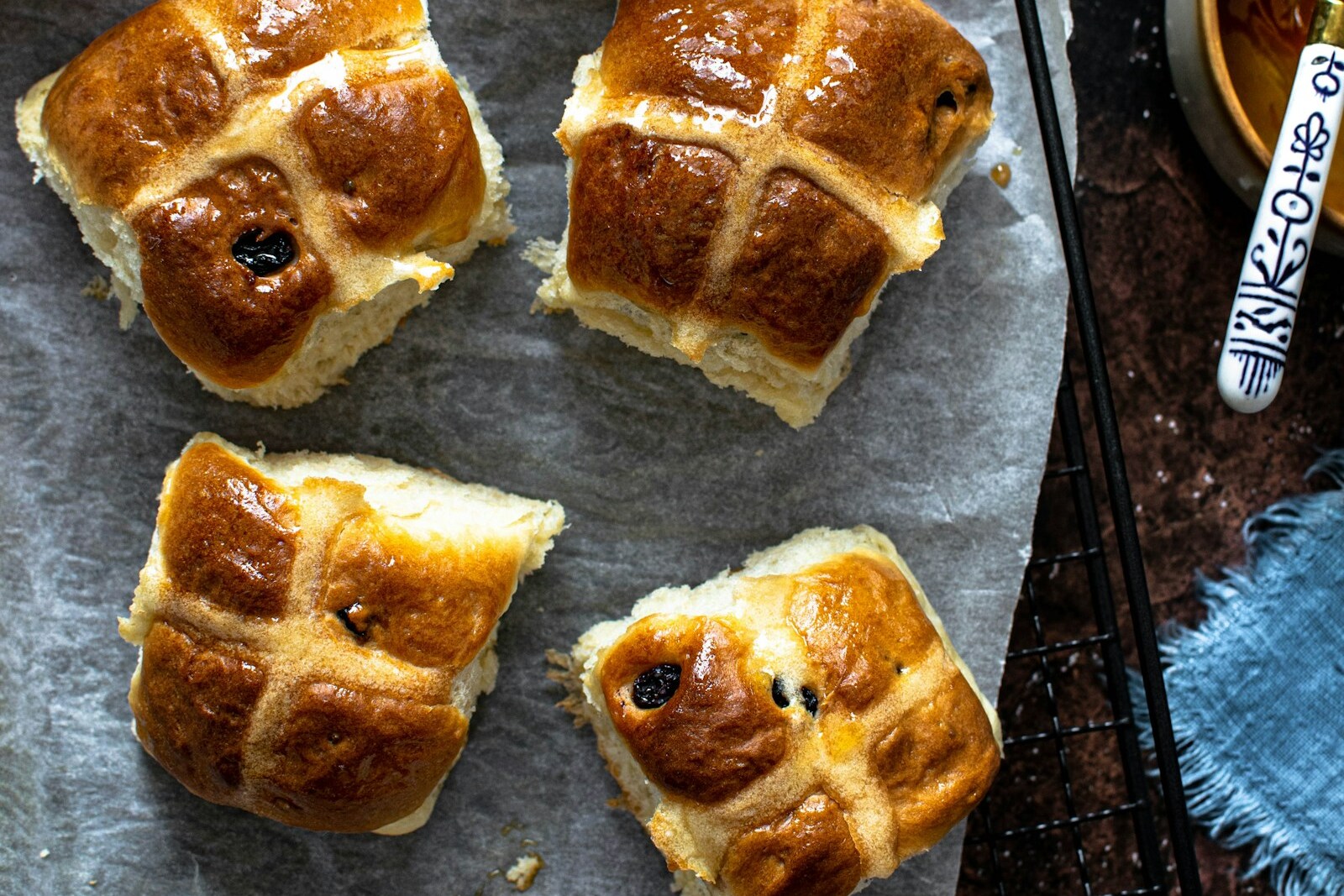 Hot cross buns with pastry cross and apricot glaze for Easter