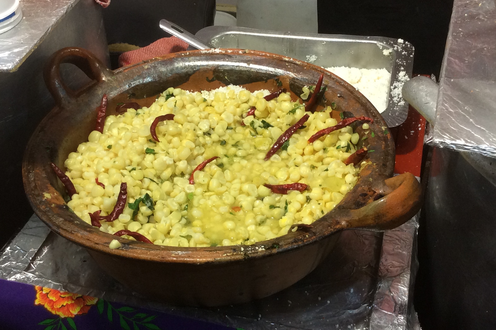 Mexican elote street corn with cotija cheese and chile powder