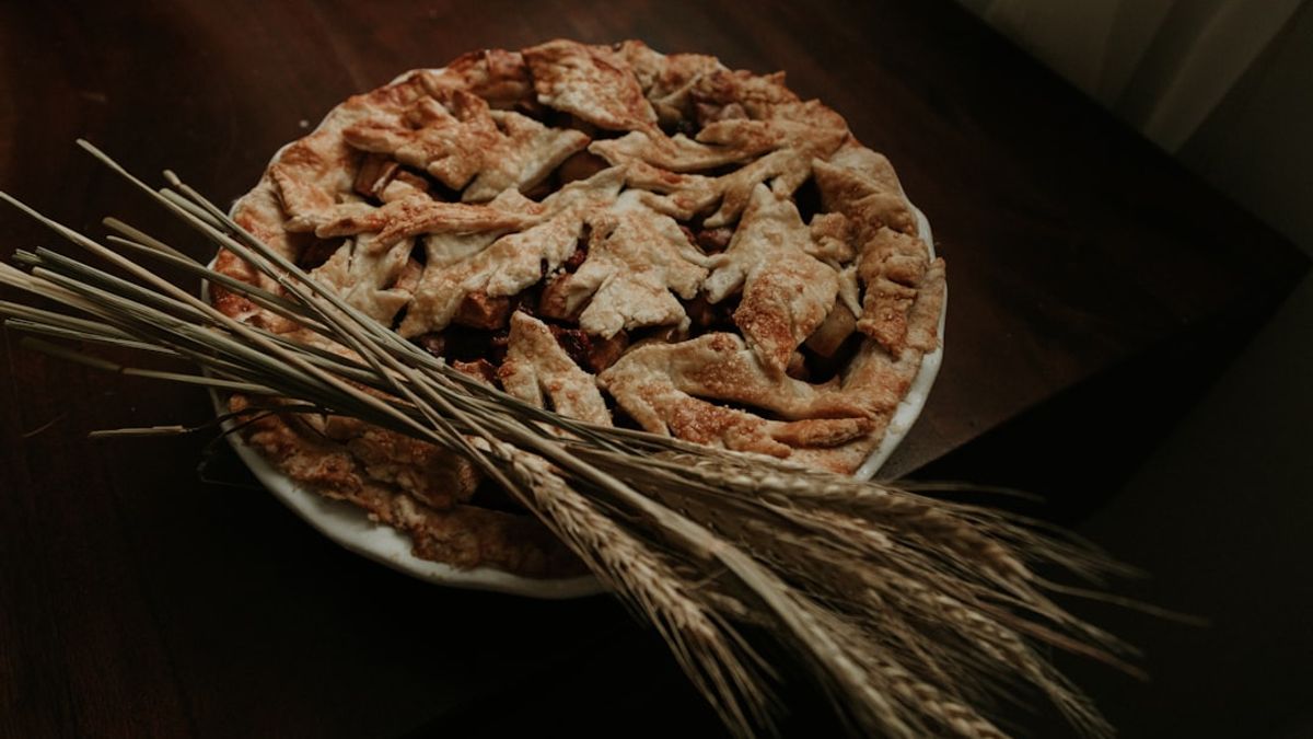 Apple pie, chocolate chip cookies, and cornbread arranged on a table – American recipes