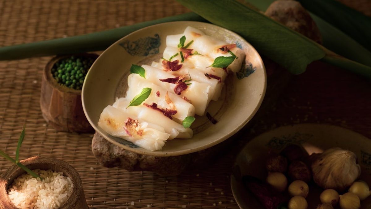 Crispy sesame tofu cubes glazed with sweet chili sauce served with stir-fried vegetables