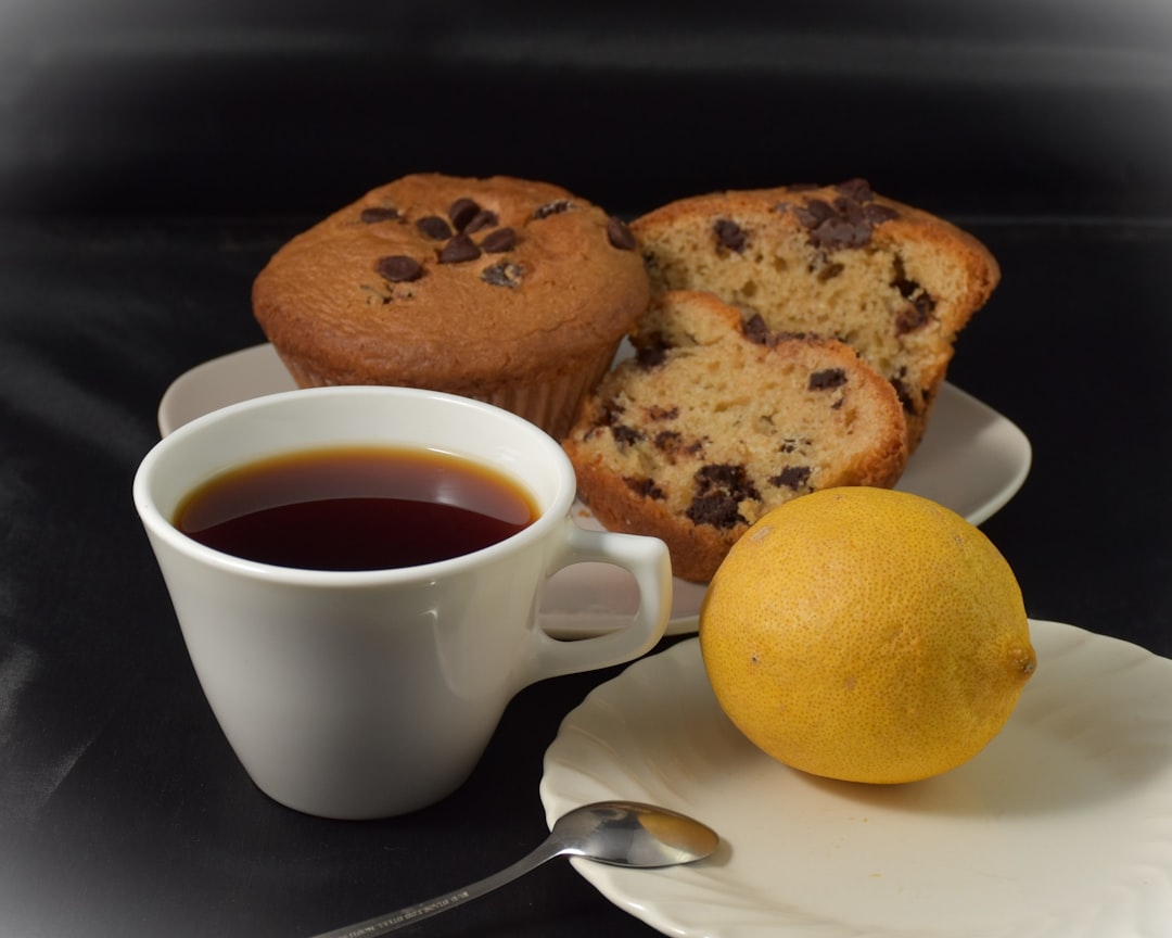 Lemon blueberry muffins with crumbly streusel topping on a wire cooling rack