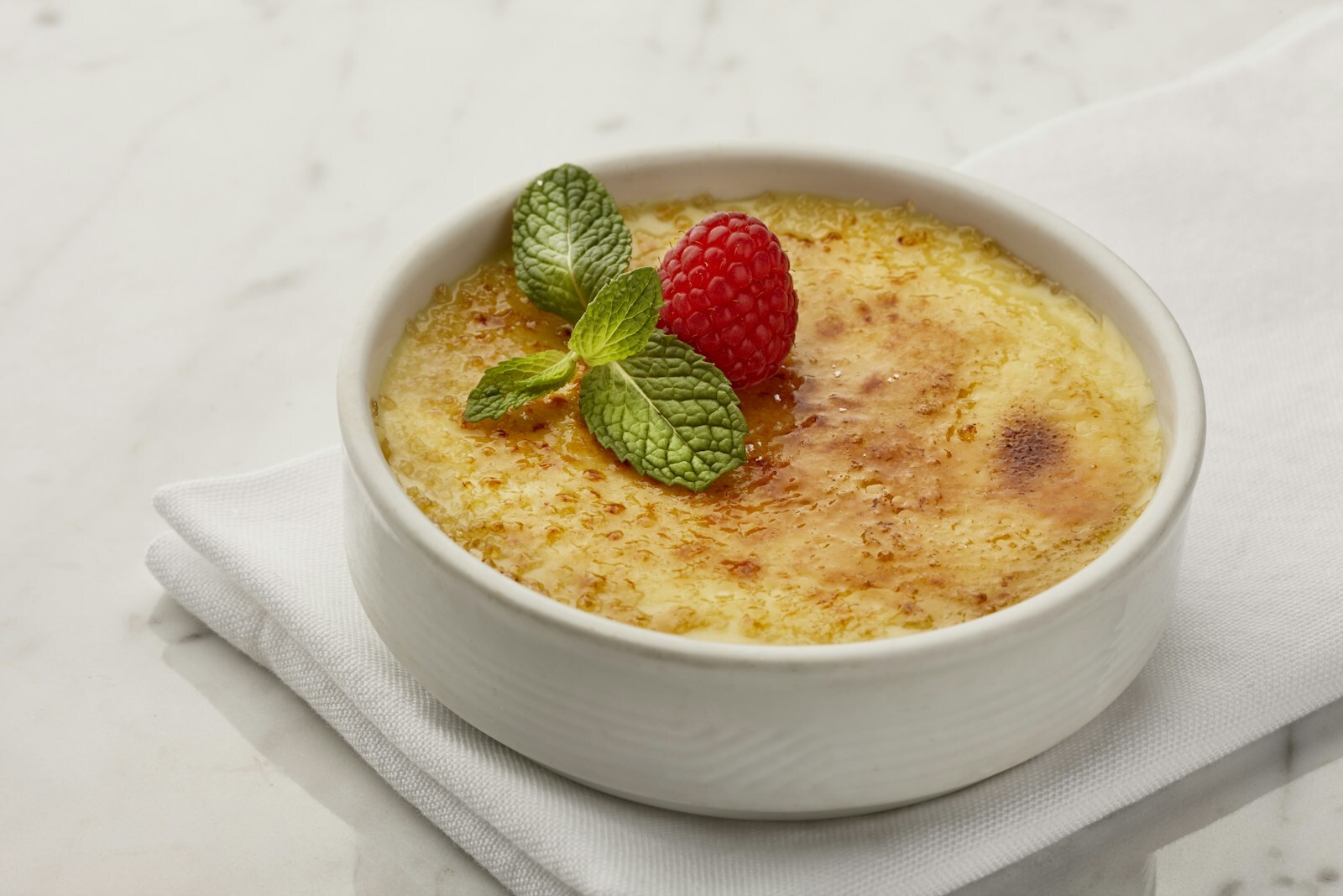 Classic French creme brulee with caramelized sugar top