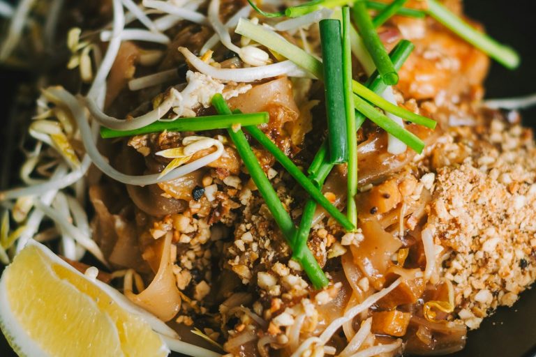 Pad thai with rice noodles, bean sprouts, and crushed peanuts